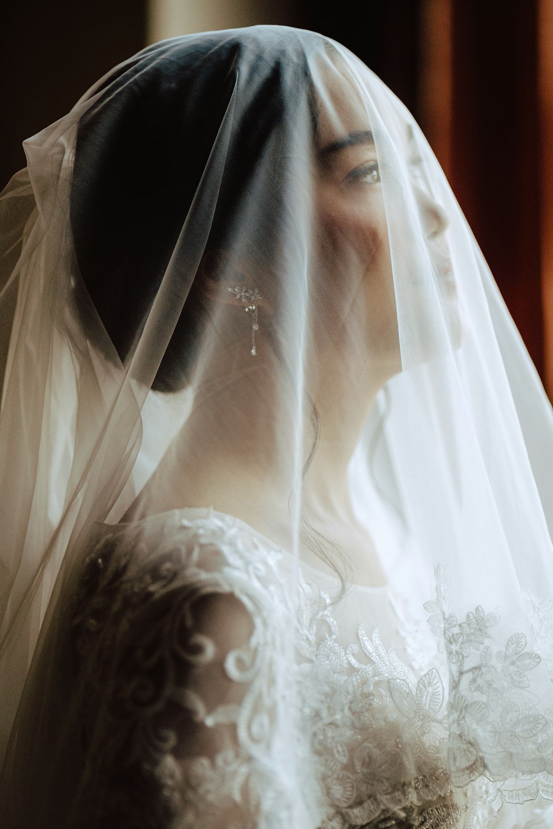Bride in a white floral wedding dress